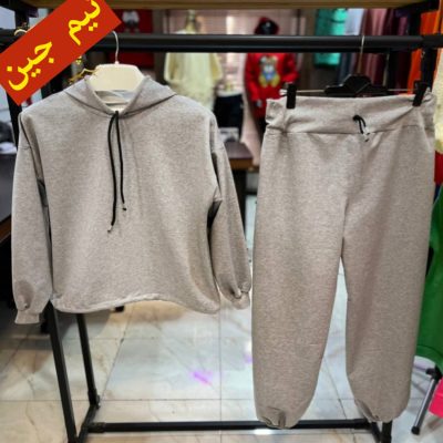 ✴️ست هودی کراپ و شلوار ملانژ ساده دمپا مچی و پایین کش✴️ کد10200 پخش عمده پوشاک