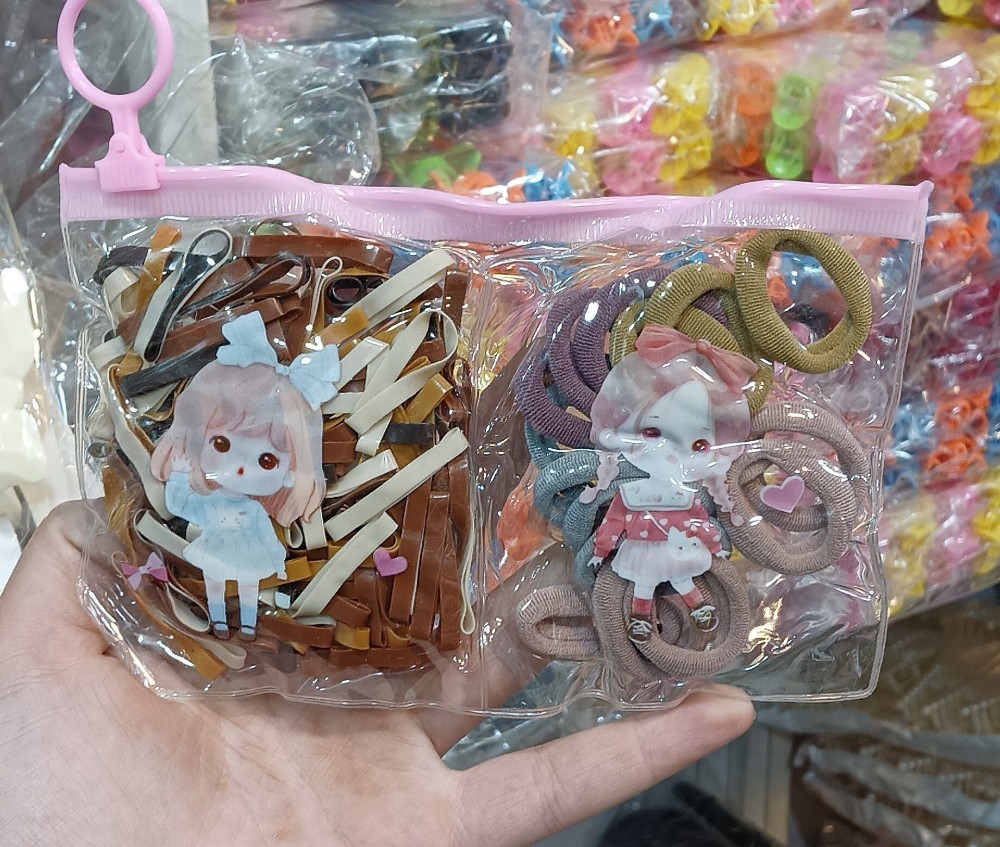 فروش عمده کیف چهل گیس و کش مو رنگ نود و بسیار کاربردی کد 131720