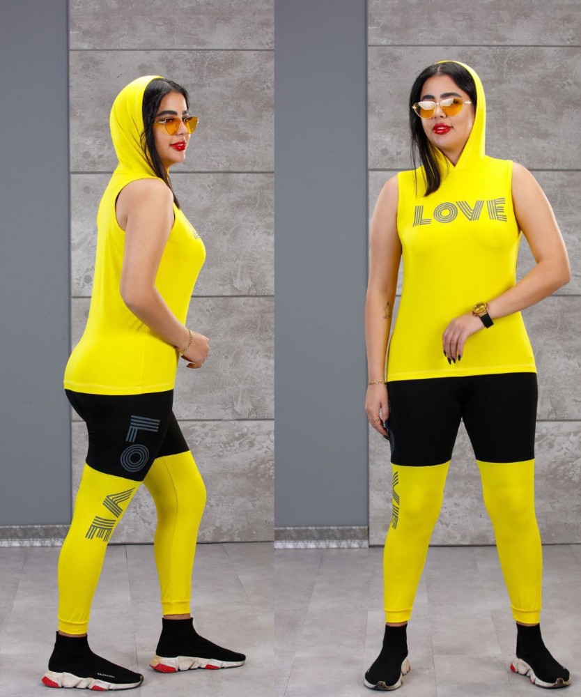 ست باشگاهی ورزشی پرفروش کد 136498 - خرید ست تاب شلوارک زنانه عمده