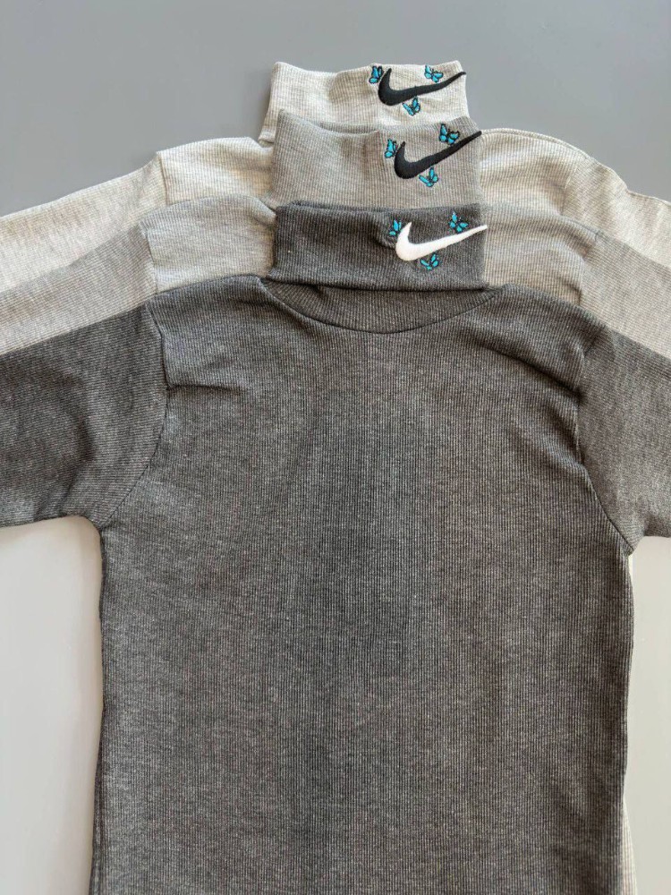 بلوز یقه اسکی گلدوزی نایک کد 136890 - خرید بلوز تک زنانه عمده