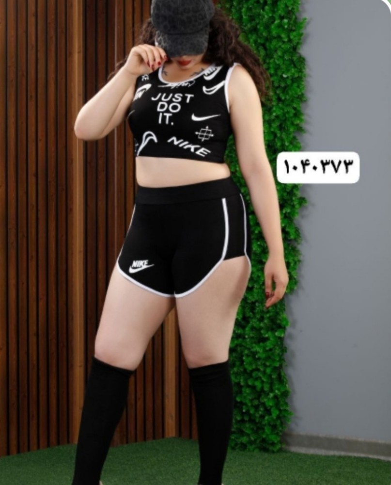 ست باشگاهی نیم تنه وشورتک نایک کد 137978 - خرید ست تاب شلوارک زنانه عمده