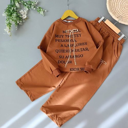 ست بلوز شلوار بگ دخترانه طرح آستین چین دار کد 134257 - خرید ست بلوز شلوار دخترانه عمده